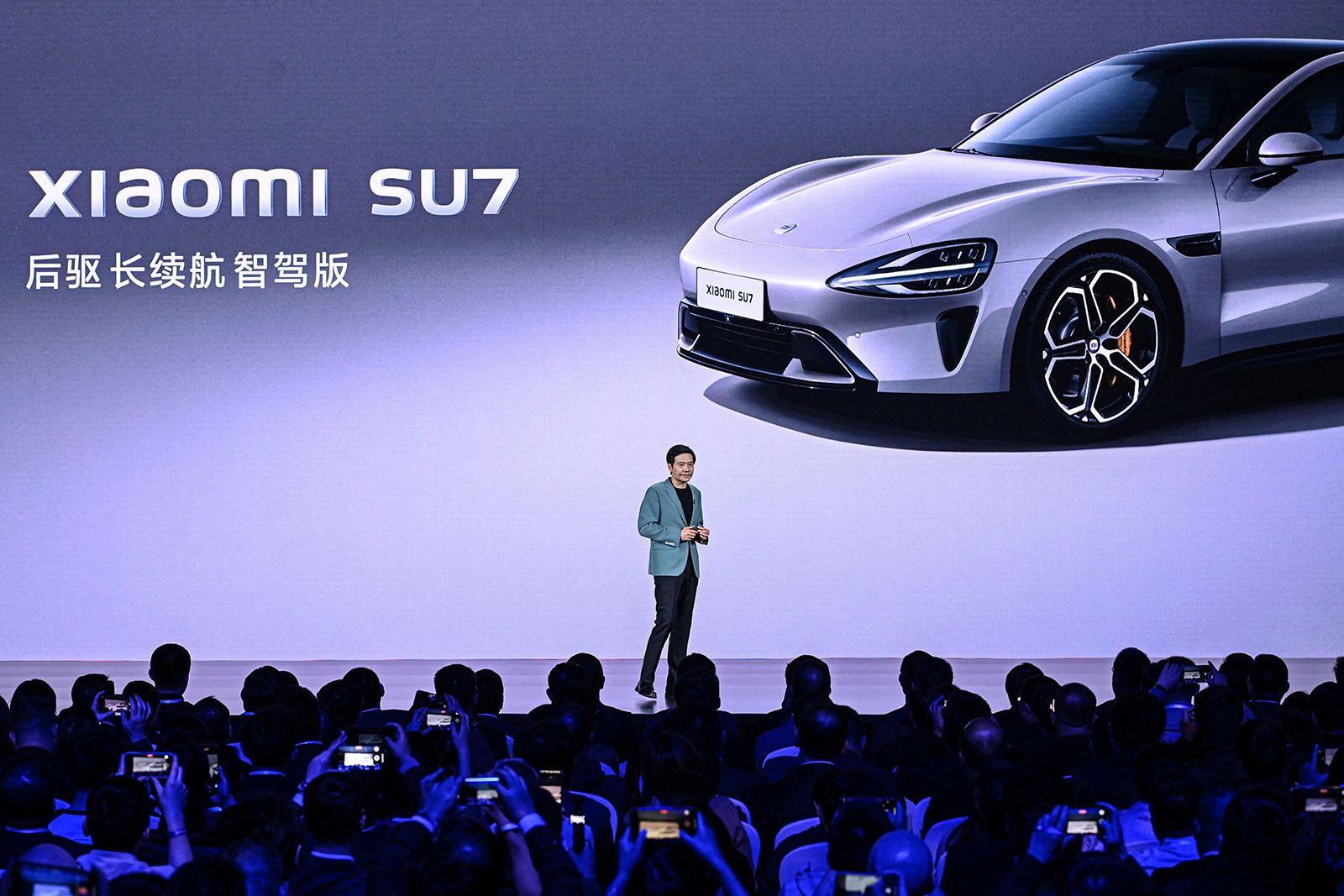 Xiaomi CEO Takes Apart Tesla Model Y To Study Its Technology